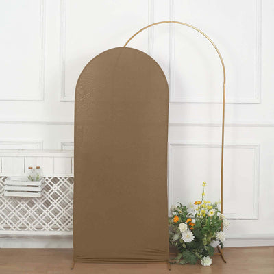 Brown backdrop with gold stand and floral arrangement