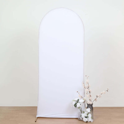 White backdrop with floral arrangement in a vase, ideal for photography.