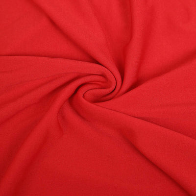 Red fabric close-up showing soft texture and vibrant color.