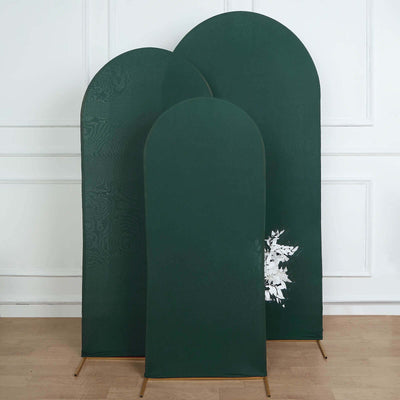 Set of three green fabric room dividers on a neutral floor background.