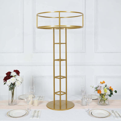Gold modern floor lamp in an elegant dining setup with floral centerpieces.