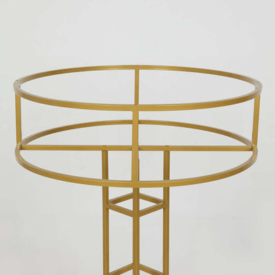 Gold metal plant stand with circular top and geometric base