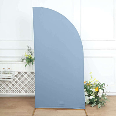 Blue fabric backdrop with curved design for photography or events.