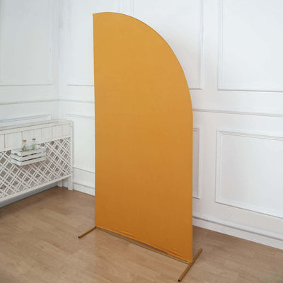 Yellow fabric backdrop stand in a modern interior setting.