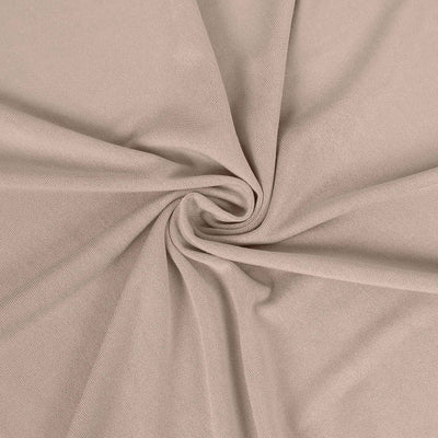 Beige fabric with a soft texture, ideal for various sewing projects.