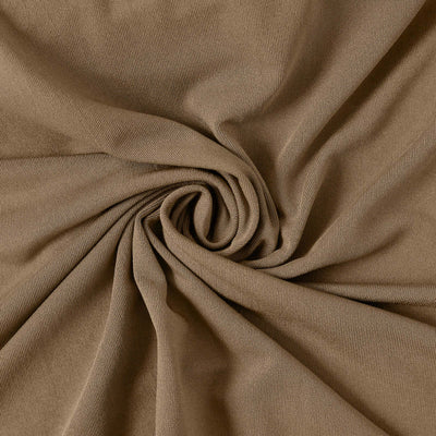 Textured brown fabric in a spiral pattern.