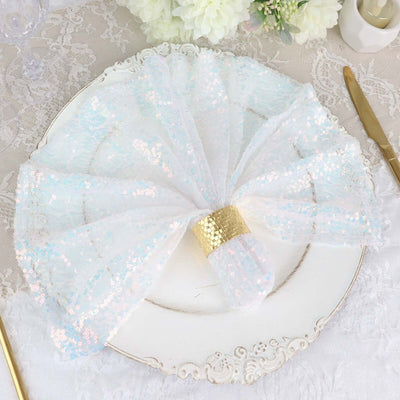 Iridescent lace napkin elegantly arranged on a decorative plate.