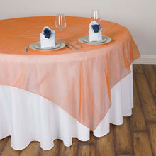 60 Inch Square Sheer Organza Table Overlay In Orange