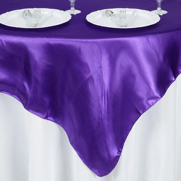 Create a Festive Atmosphere with the Purple Square Smooth Satin Table Overlay 60"x60"
