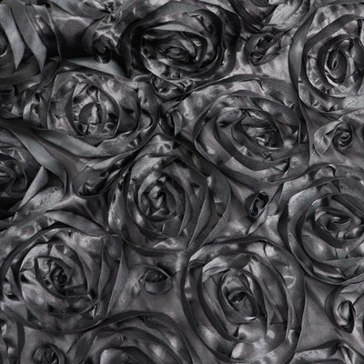 Black satin rose fabric texture close-up.