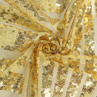 Gold sequin fabric with a shimmering texture, perfect for crafts and decorations.