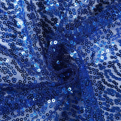 Blue sequin fabric in a swirling pattern, showcasing its shimmering texture.
