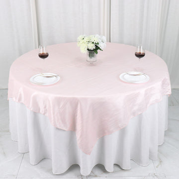 Dress Up Your Event Tables with the Timeless Beauty of Blush Accordion Crinkle Taffeta Table Overlays