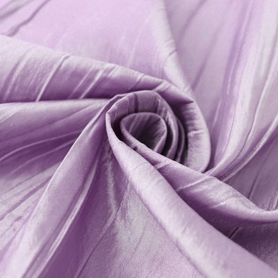 Purple silk fabric with a smooth, glossy texture, elegantly draped.