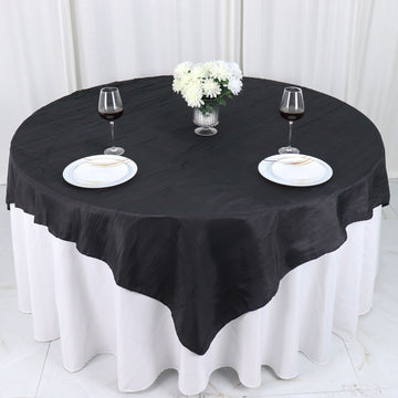 Unleash Elegance with the Black Accordion Crinkle Taffeta Table Overlay