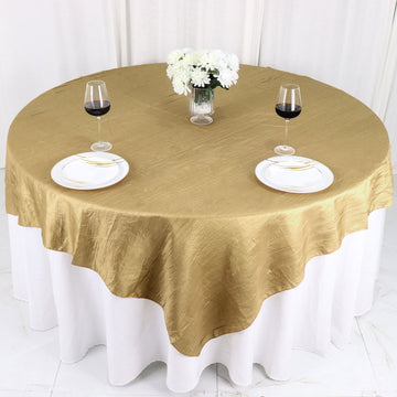 Complete Your Event Decor with the Gold Square Accordion Crinkle Taffeta Table Overlay