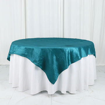 Add Elegance to Your Tablescape with the Peacock Teal Accordion Crinkle Taffeta Table Overlay