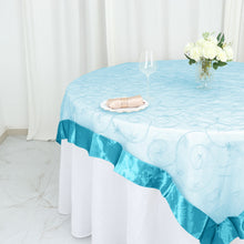Embroidered Organza Square Table Overlay With Turquoise Satin Edge 72 Inch x 72 Inch