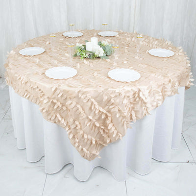 Elegant beige tablecloth with leaf design, set for a stylish dining arrangement.