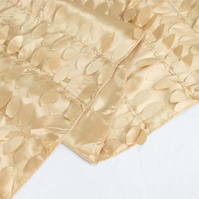 Gold satin fabric with textured leaf pattern.