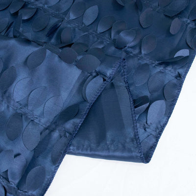 Navy blue textured fabric with circular cutouts and a smooth finish.
