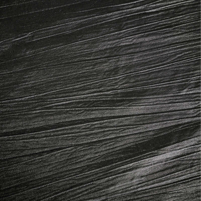 Textured black fabric with a crinkled appearance.