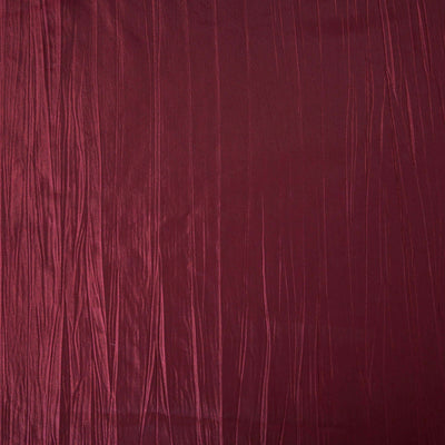Burgundy textured fabric with a silky sheen and pleated design