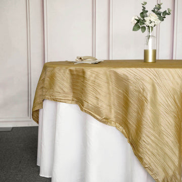 Enhance Your Event Decor with the Gold Accordion Crinkle Taffeta Table Overlay