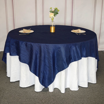 Elevate Your Event Decor with the Navy Blue Accordion Crinkle Taffeta Square Table Overlay