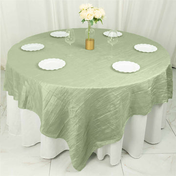 Create a Serene and Elegant Ambiance with Sage Green Accordion Crinkle Taffeta Square Table Overlay