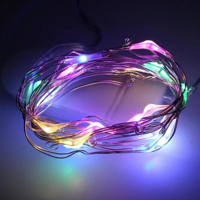 Colorful LED fairy lights on a wire, ideal for decoration.