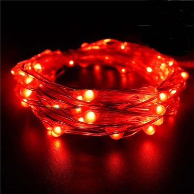 Red LED string lights on a dark background.