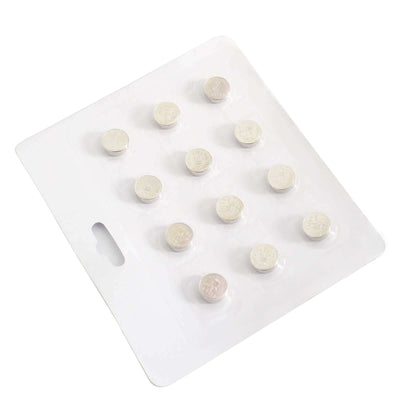 Pack of 12 silver coin cell batteries on a white background.