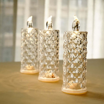 Elegant decorative crystal candle holders on a table.