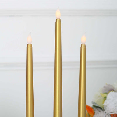 Gold LED taper candles with flame flicker effect