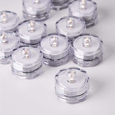 Clear LED tea light candles in a stack