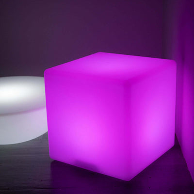 Purple glowing cube light for modern decor.