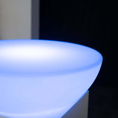 Modern blue illuminated bowl, perfect for decorative or functional use.