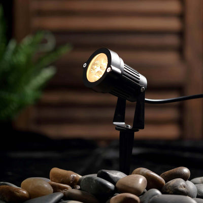 Outdoor landscape spotlight on rocks with soft lighting.