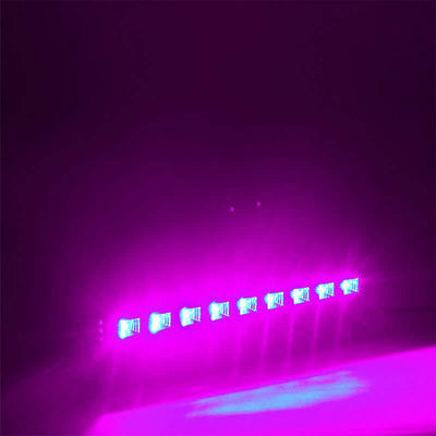Purple LED light bar on a plain backdrop.