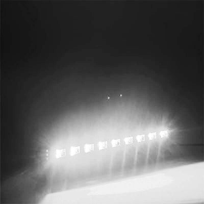 LED light bar with multiple bright lights on a dark background.