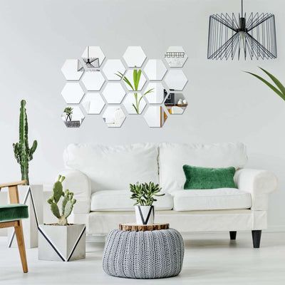 Stylish hexagonal mirror decor in a modern living room setting.