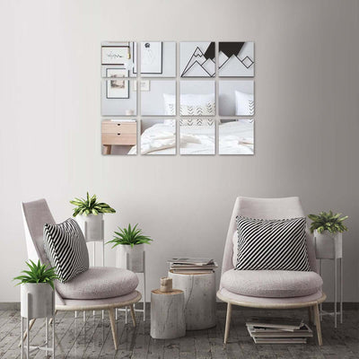 Modern living room with stylish chairs, plants, and wall art in a cozy setting.