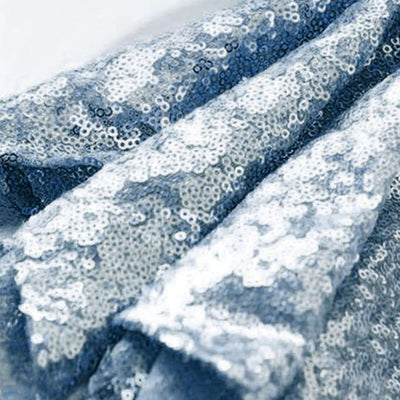 Blue and silver sequin fabric draped elegantly.