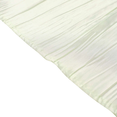 Sheer light green fabric with crinkled texture.