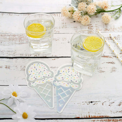Colorful ice cream cone coasters next to glasses of water with lemon slices.