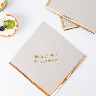 Personalized wedding napkin with gold foil lettering "Beth & Tyler Forever & Ever"