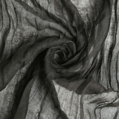 Black sheer fabric with a textured swirl pattern.