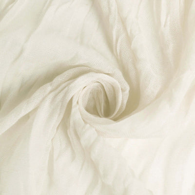 Lightweight cream fabric texture swirling in a soft, airy pattern.