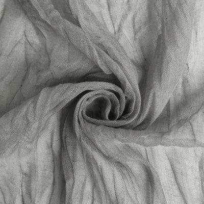 Gray textured fabric in a swirling pattern.